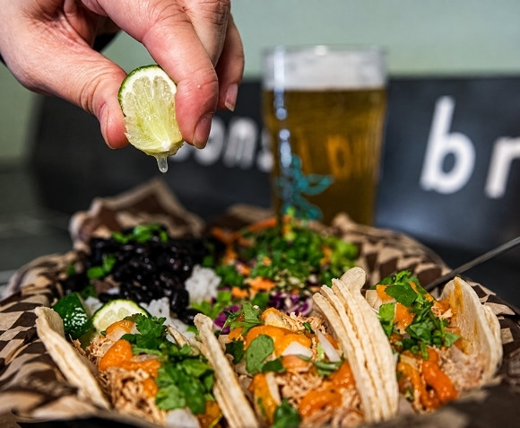 Fresh tacos with lime, rice, beans and craft beer at Bonsai Brewing in Whitefish, MT